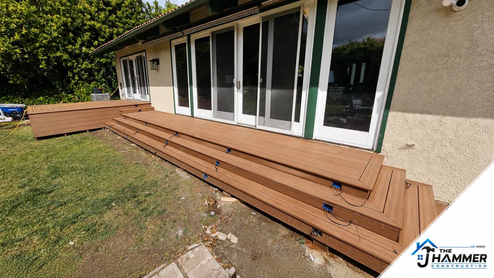 Paver Patio vs. Wood Deck vs. Concrete: Choosing Your Outdoor Floor — The J Hammer Inc project photo
